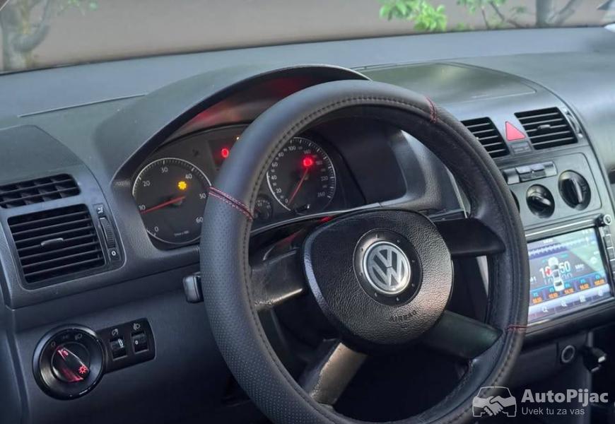2005_volkswagen_tuaran_19_tdi_7_sedista_77_kw_11_polovni_automobili_autopijac.rs