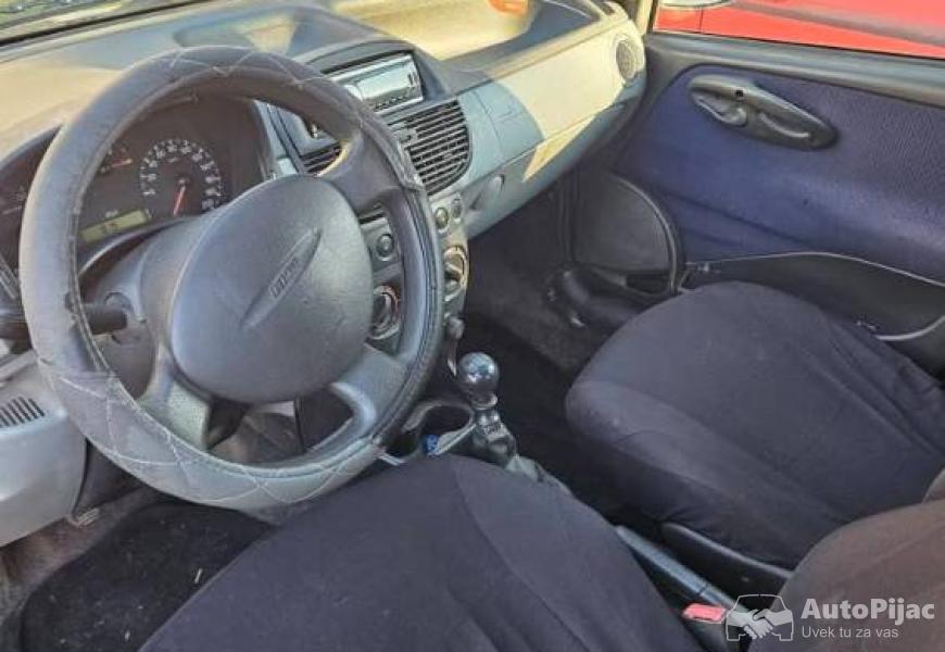fiat_punto_12_8_ventila_2002_godbez_ulaganja_reg_d_7_polovni_automobili_autopijac.rs